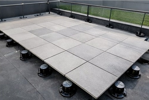 Rénovation d'une terrasse sur toit - dalles sur plot